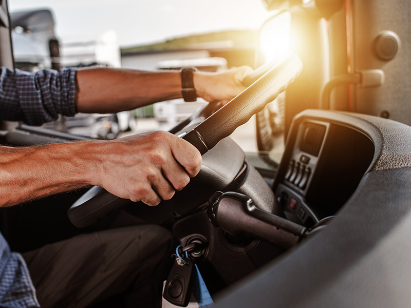 CDL commercial driver inside of his truck